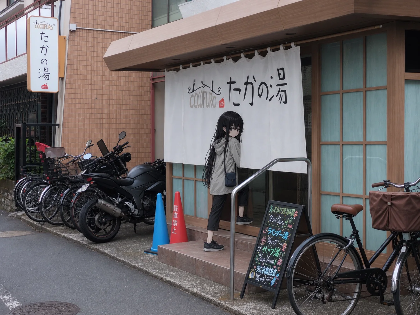 たかの湯の前に立つ凜